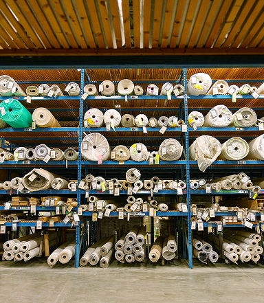 large rolls of flooring material